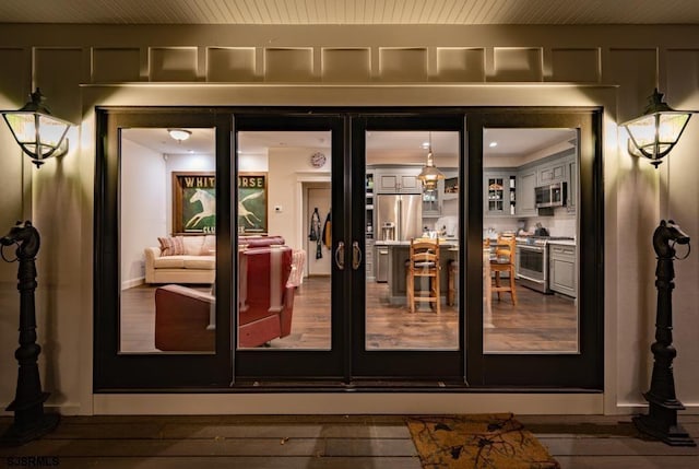 entryway with dark wood-type flooring