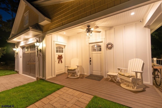 doorway to property featuring ceiling fan