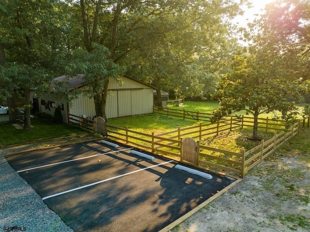 view of horse barn with a rural view