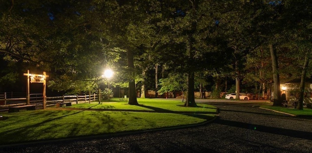 view of home's community featuring a yard