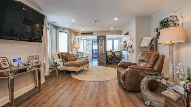 living room with wood-type flooring