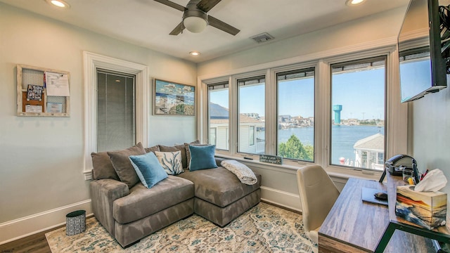 home office featuring ceiling fan and wood-type flooring