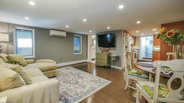 living room featuring dark wood-type flooring, an AC wall unit, and a baseboard heating unit