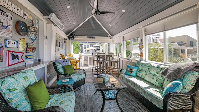 sunroom / solarium with wood ceiling, ceiling fan, a healthy amount of sunlight, and lofted ceiling