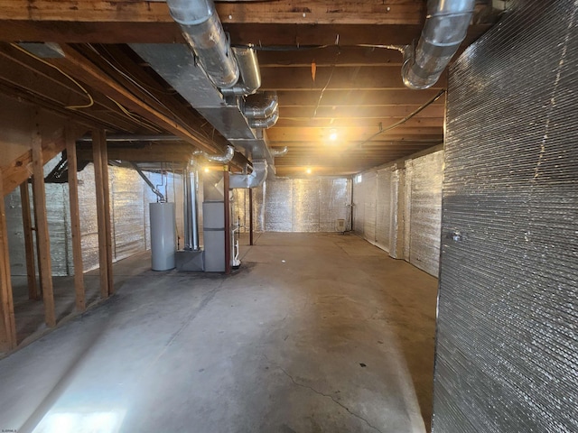 basement with heating unit and water heater