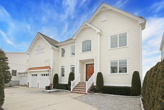 view of front of home with a garage