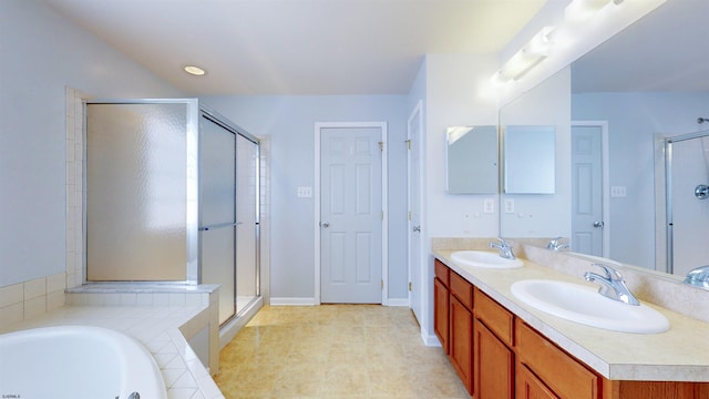 bathroom with vanity and plus walk in shower