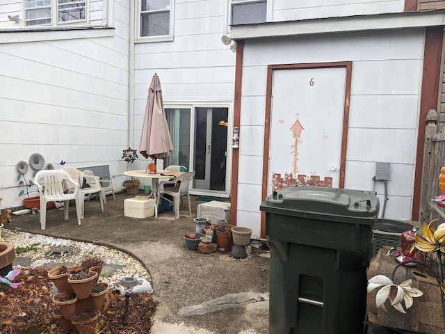 property entrance featuring a patio and central AC unit