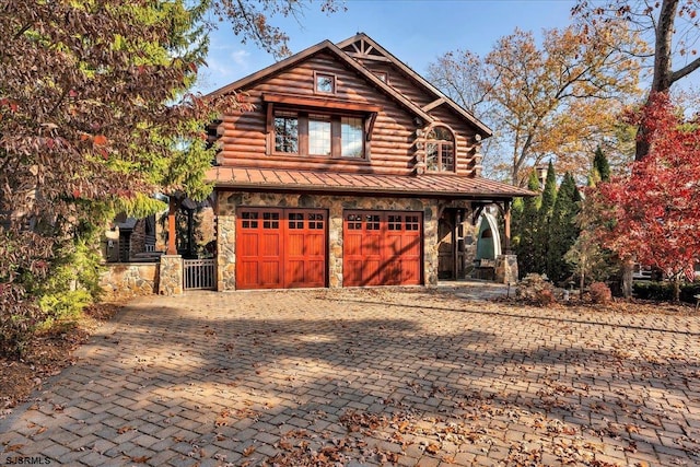 view of front of property featuring a garage