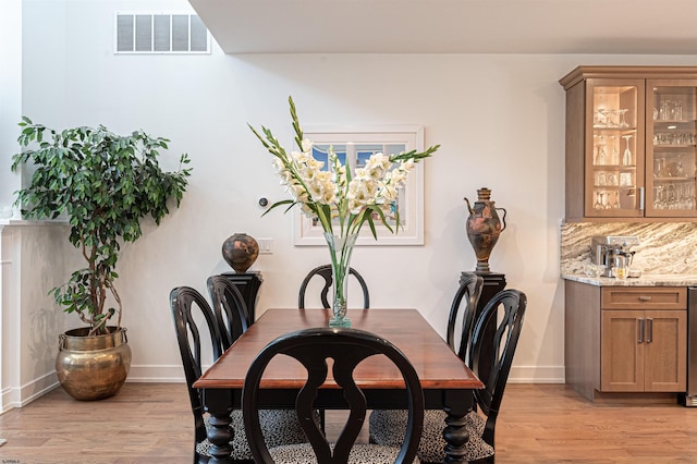 dining room featuring light wood-type flooring