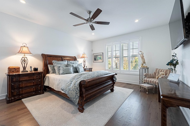 bedroom featuring hardwood / wood-style floors and ceiling fan