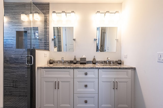 bathroom with vanity and walk in shower