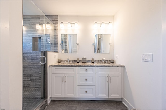 bathroom with vanity and walk in shower