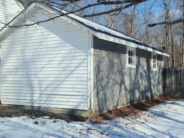 view of snow covered property