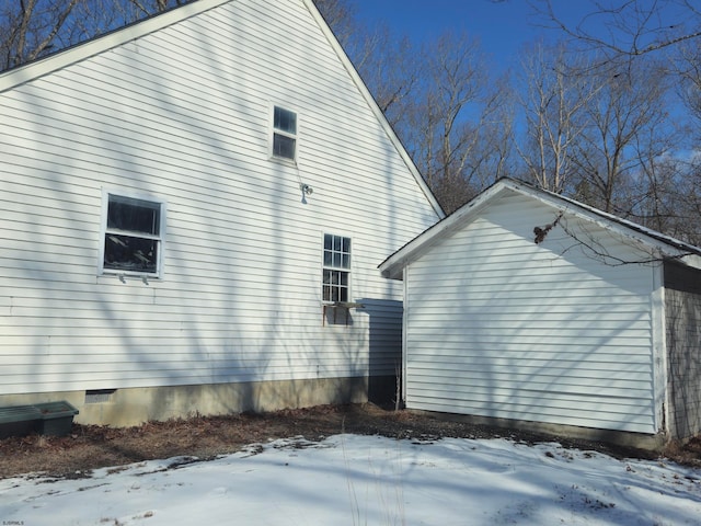 view of snow covered property