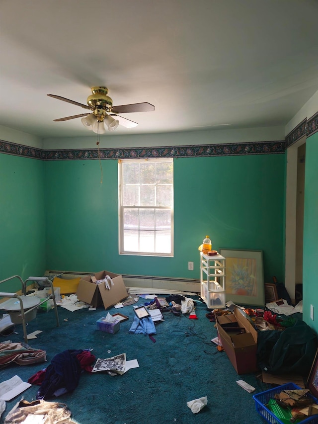 bedroom with ceiling fan and carpet