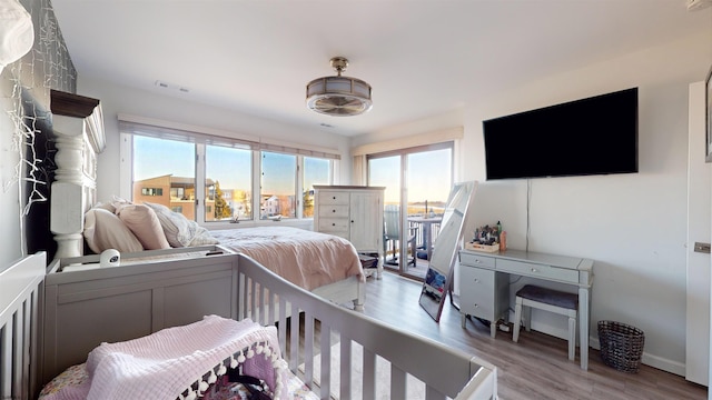 bedroom featuring light wood-type flooring