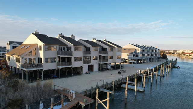 exterior space with a water view