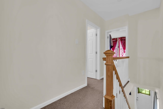 corridor featuring carpet flooring