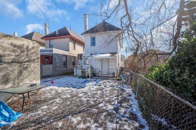 view of snow covered property