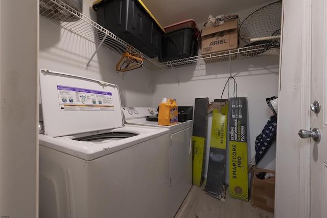 washroom featuring separate washer and dryer