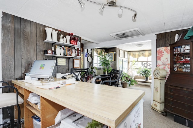 office space featuring wood walls