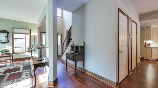 hallway featuring dark hardwood / wood-style flooring