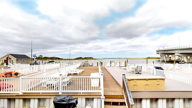 dock area featuring a water view