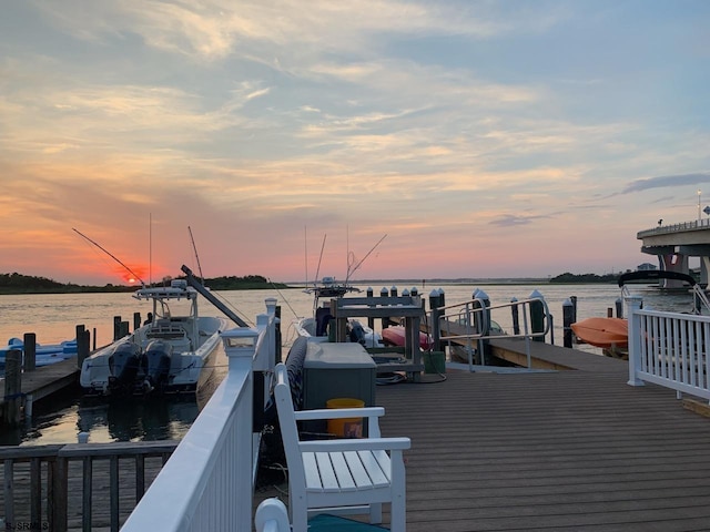 view of dock with a water view