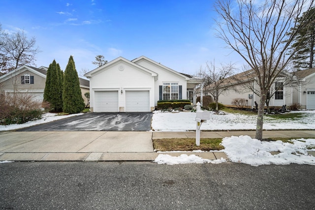 single story home featuring a garage