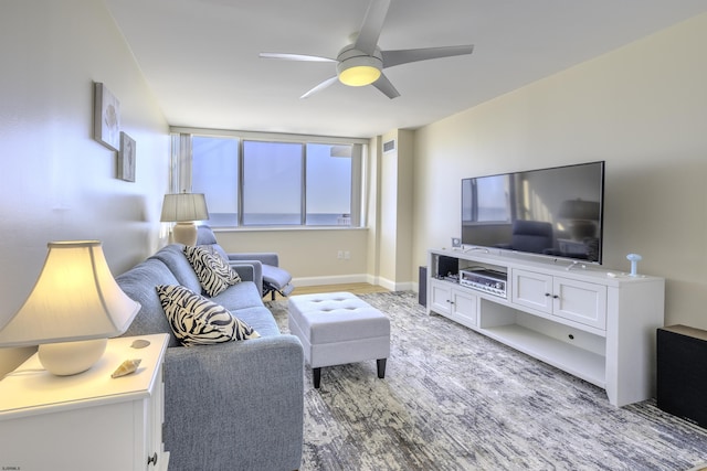 living room with ceiling fan