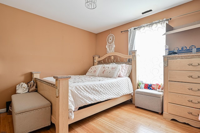 bedroom featuring light hardwood / wood-style floors