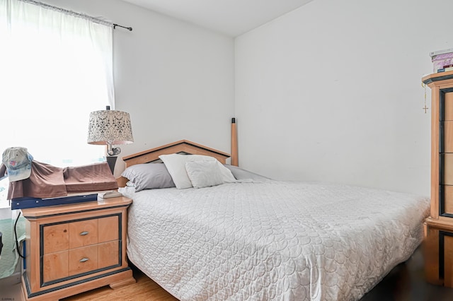 bedroom featuring light wood-type flooring