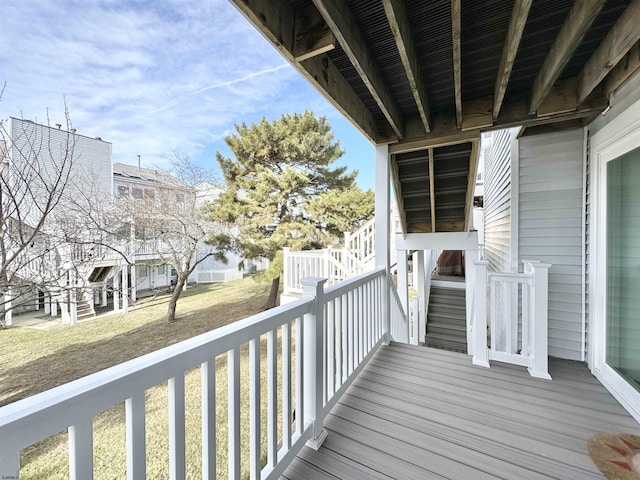 wooden balcony featuring a deck