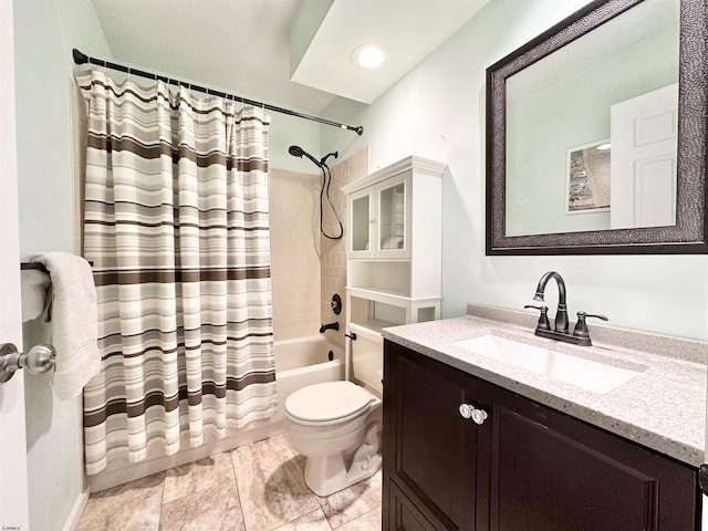 full bathroom featuring vanity, shower / bath combo, and toilet