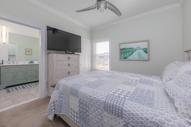 bedroom featuring sink, ensuite bath, ceiling fan, ornamental molding, and light carpet