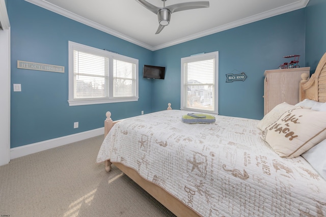 bedroom with crown molding, ceiling fan, and carpet