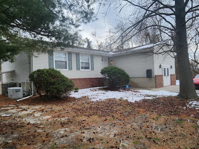 view of home's exterior featuring cooling unit