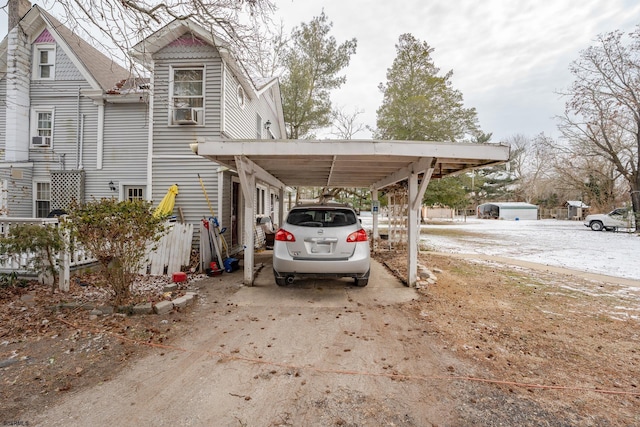 view of parking featuring a carport