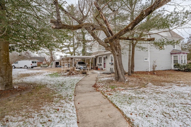 view of yard covered in snow