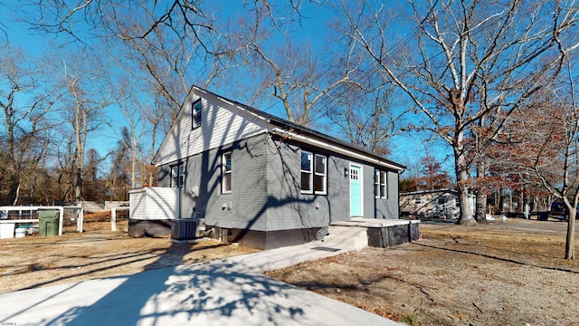 view of home's exterior with central AC