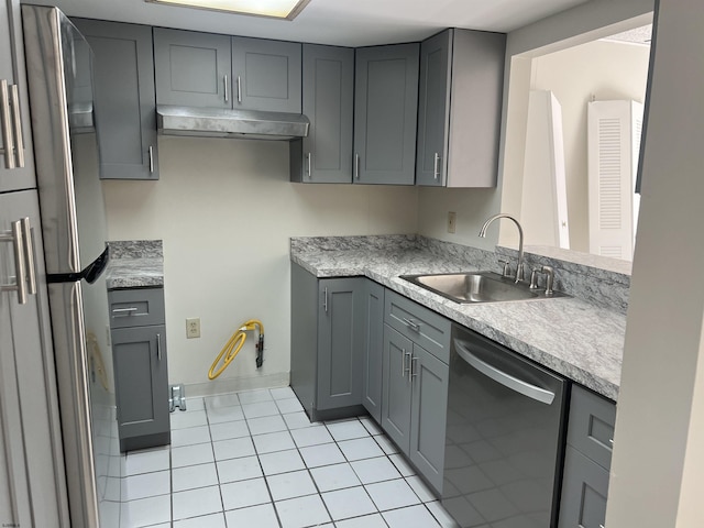 kitchen featuring light tile patterned floors, appliances with stainless steel finishes, sink, and gray cabinetry