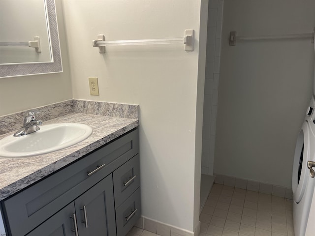 bathroom with vanity and tile patterned floors