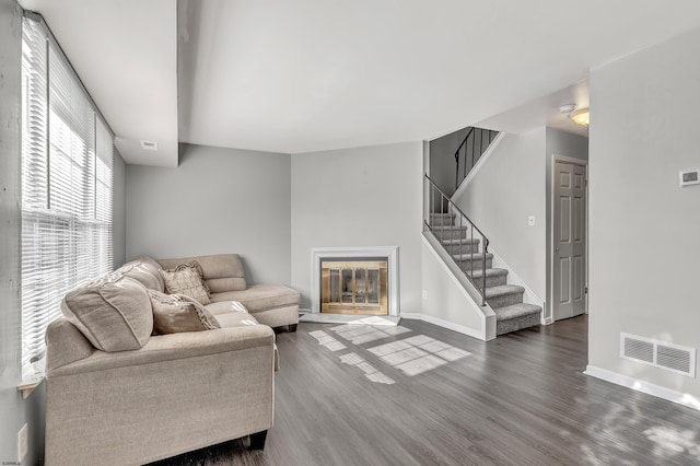 living room with dark wood-type flooring