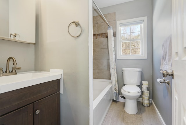 full bathroom with vanity, shower / bath combo, and toilet