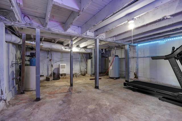 basement featuring water heater and electric water heater