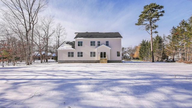 view of snow covered property