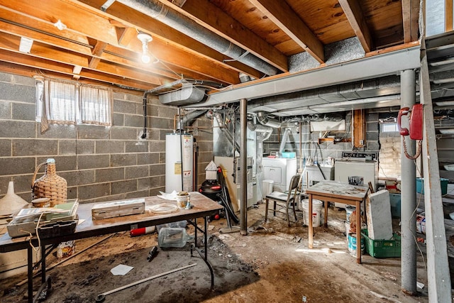 basement with washer and clothes dryer and gas water heater