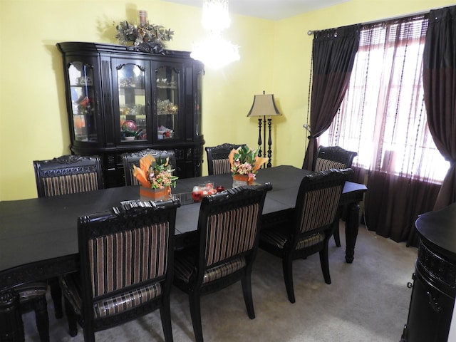 dining space with carpet floors