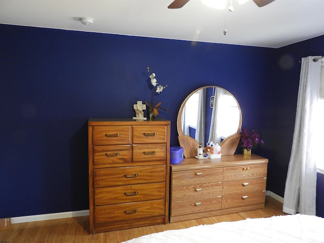 bedroom featuring ceiling fan and light wood-type flooring